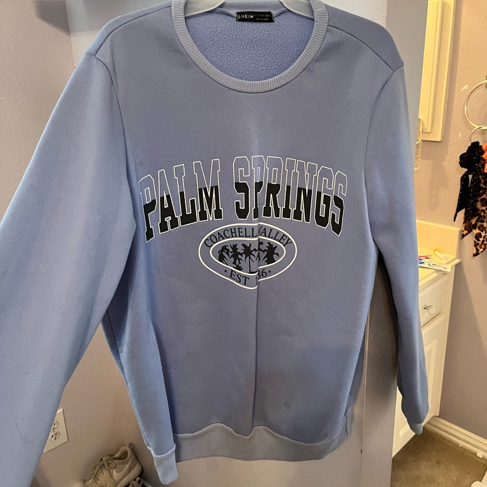 blue sweatshirt